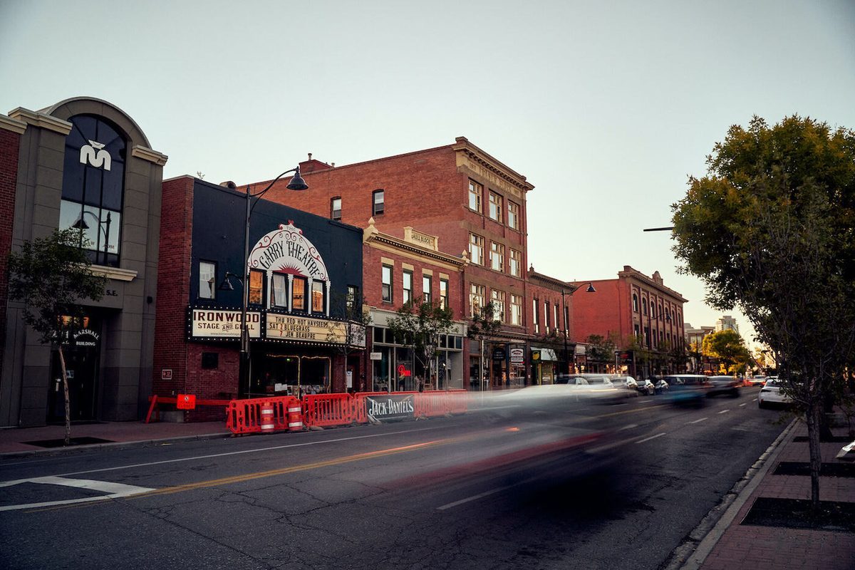 The Garry Theatre and brick buildings on 9 Avenue in Inglewood