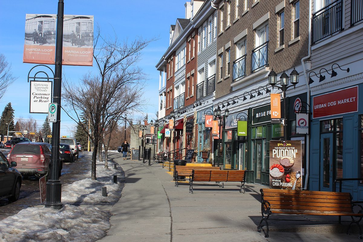 Shops and benches along 33 Avenue in Marda Loop